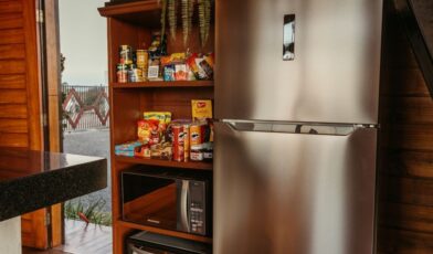 Refrigerator in a residential kitchen where a homeowner is checking an unfamiliar sound