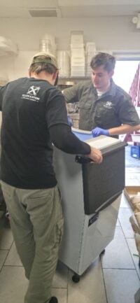 Ice machine pulled out for access during a Denver Metro repair