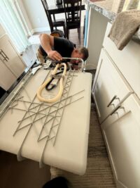 Dishwasher racks removed during a wash system service call