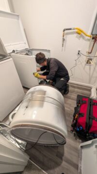 Dryer drum removed during a noise repair in Denver Metro