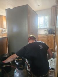 Refrigerant recovery and recharge on a residential refrigerator sealed system
