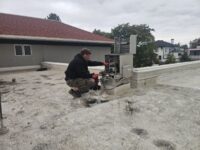 Outdoor condensing unit checked during a walk-in repair in Denver Metro