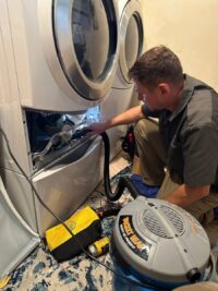 Draining a stalled front load washer before pump service